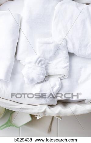 laundry basket with whites in it View Large Photo Image Stock Photo - laundry basket with whites in it. Fotosearch