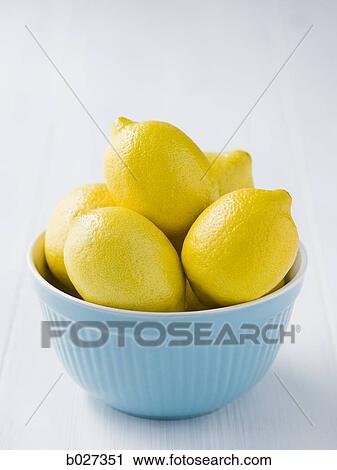 lemons in a blue bowl View Large Photo Image Stock Image - lemons in a blue bowl. Fotosearch