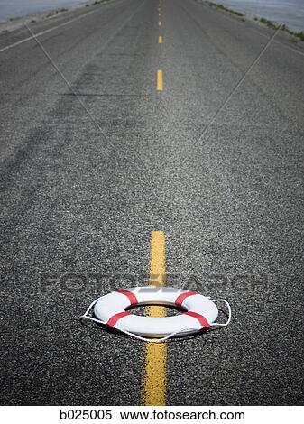 life preserver in the middle of the highway View Large Photo Image Stock Photography - life preserver in the middle of the highway. Fotosearch