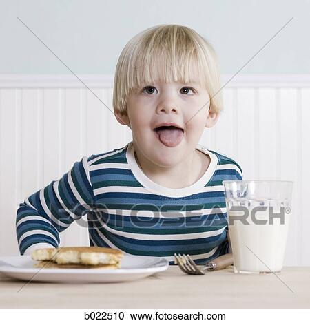 little boy eating breakfast View Large Photo Image Stock Image - little boy eating breakfast. Fotosearch