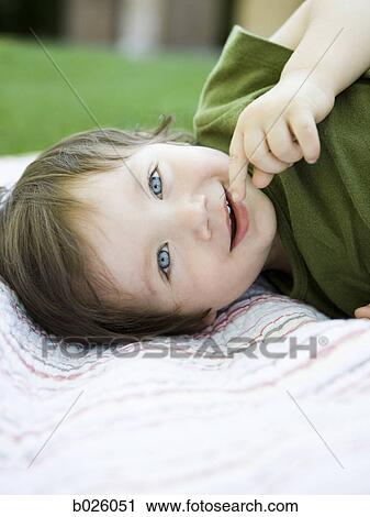 little boy in a green shirt View Large Photo Image Stock Image - little boy in a green shirt. Fotosearch