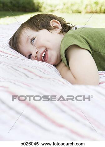 little boy in a green shirt View Large Photo Image Stock Photography - little boy in a green shirt. Fotosearch