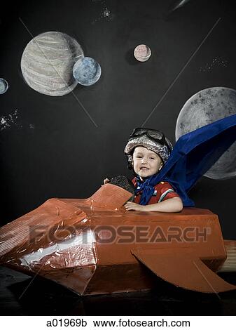 little boy in a rocketship View Large Photo Image Stock Image - little boy in a rocketship. Fotosearch