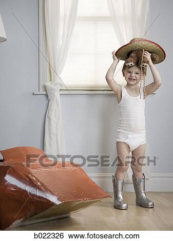 little boy in his room with a red rocketship View Large Photo Image Stock Photograph - little boy in his room with a red rocketship. Fotosearch