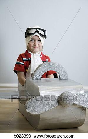 little boy playing dress up View Large Photo Image Stock Image - little boy playing dress up. Fotosearch