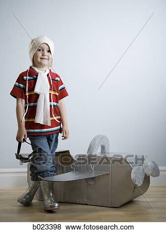 little boy playing dress up View Large Photo Image Stock Photo - little boy playing dress up. Fotosearch