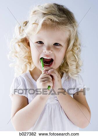 little girl brushing her teeth View Large Photo Image Stock Image - little girl brushing her teeth. Fotosearch