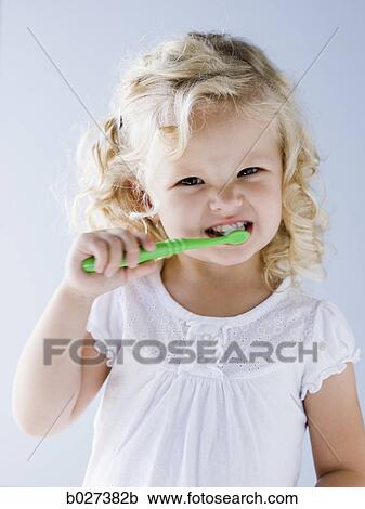 little girl brushing her teeth View Large Photo Image Stock Image - little girl brushing her teeth. Fotosearch