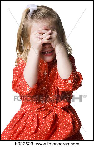 little girl covering her eyes View Large Photo Image Stock Image - little girl covering her eyes. Fotosearch