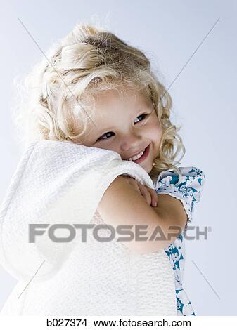little girl holding her blanket View Large Photo Image Picture - little girl holding her blanket. Fotosearch