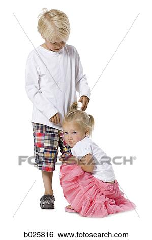 little girl holding on to her brother's leg View Large Photo Image Stock Photograph - little girl holding on to her brother's leg. Fotosearch