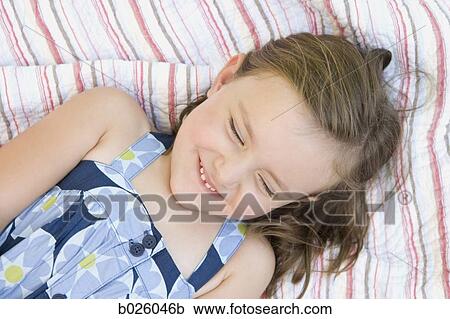 little girl in a blue dress View Large Photo Image Stock Image - little girl in a blue dress. Fotosearch
