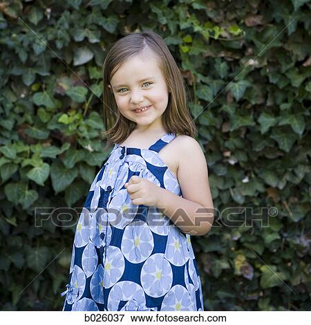 little girl in a blue dress View Large Photo Image Stock Photo - little girl in a blue dress. Fotosearch