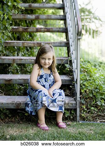 little girl in a blue dress View Large Photo Image Stock Photo - little girl in a blue dress. Fotosearch