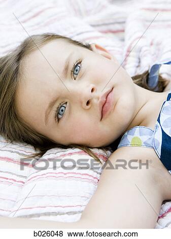 little girl in a blue dress View Large Photo Image Stock Photo - little girl in a blue dress. Fotosearch