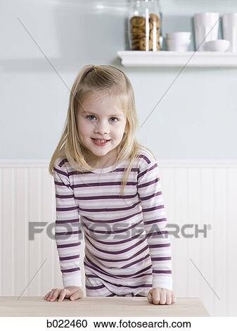 little girl in the kitchen View Large Photo Image Stock Image - little girl in the kitchen. Fotosearch