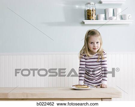 little girl in the kitchen View Large Photo Image Stock Image - little girl in the kitchen. Fotosearch