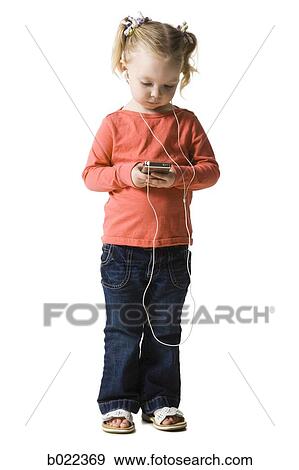 little girl listening to mp3 player View Large Photo Image Stock Photo - little girl listening to mp3 player. Fotosearch