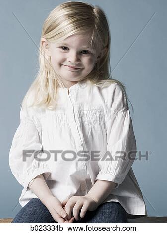little girl looking at the camera View Large Photo Image Stock Image - little girl looking at the camera. Fotosearch