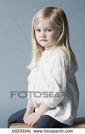 little girl looking at the camera View Large Photo Image Stock Image - little girl looking at the camera. Fotosearch