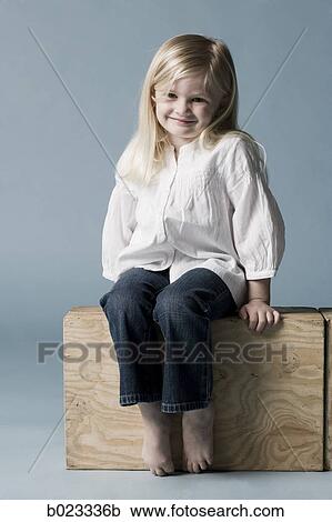 little girl looking at the camera View Large Photo Image Stock Image - little girl looking at the camera. Fotosearch