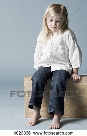 little girl looking at the camera View Large Photo Image Stock Photograph - little girl looking at the camera. Fotosearch