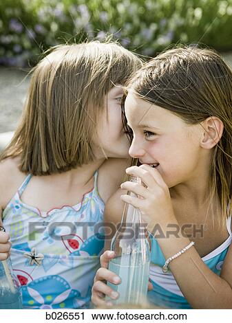 little girls in their swimsuits View Large Photo Image Stock Image - little girls in their swimsuits. Fotosearch