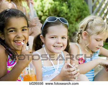 little girls in their swimsuits View Large Photo Image Stock Photograph - little girls in their swimsuits. Fotosearch