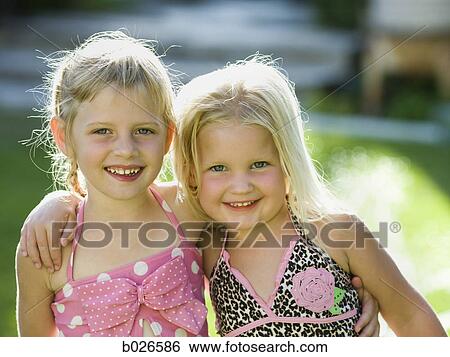 little girls in their swimsuits View Large Photo Image Stock Photograph - little girls in their swimsuits. Fotosearch