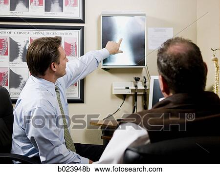 man at chiropractor's office View Large Photo Image Stock Image - man at chiropractor's office. Fotosearch