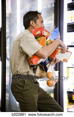 man at the grocery store View Large Photo Image Stock Image - man at the grocery store. Fotosearch