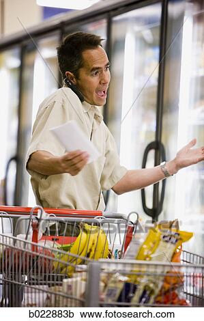 man at the grocery store View Large Photo Image Stock Image - man at the grocery store. Fotosearch