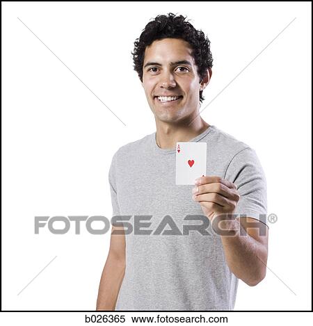 man covering his face with playing cards View Large Photo Image Stock Photography - man covering his face with playing cards. Fotosearch