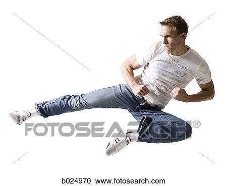 man doing a karate kick View Large Photo Image Stock Image - man doing a karate kick. Fotosearch