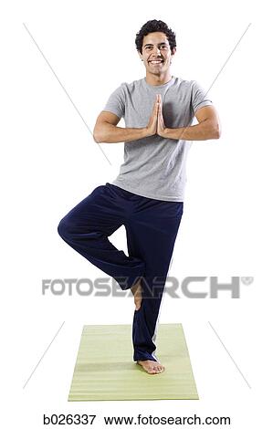 man doing yoga View Large Photo Image Stock Photo - man doing yoga. Fotosearch