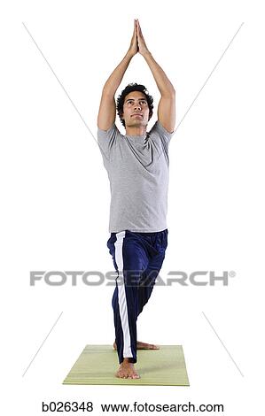 man doing yoga View Large Photo Image Stock Photo - man doing yoga. Fotosearch