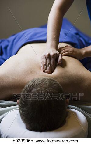 man getting a massage View Large Photo Image Stock Image - man getting a massage. Fotosearch