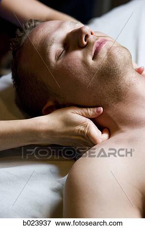 Stock Photo - man getting a massage. Fotosearch