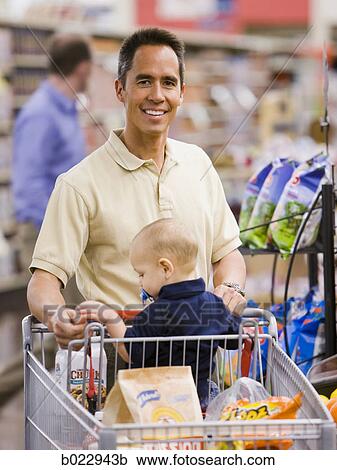 man grocery shopping with baby View Large Photo Image Stock Image - man grocery shopping with baby. Fotosearch