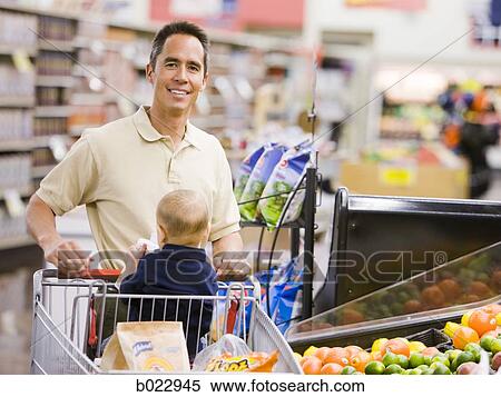 man grocery shopping with baby View Large Photo Image Stock Photography - man grocery shopping with baby. Fotosearch