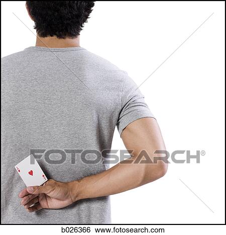 man holding an ace card behind his back View Large Photo Image Stock Photograph - man holding an ace card behind his back. Fotosearch