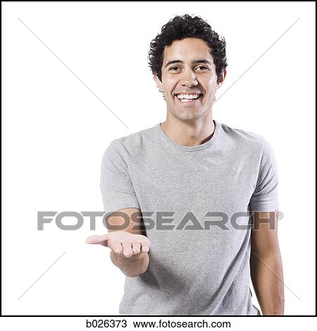 man holding his hand out View Large Photo Image Stock Image - man holding his hand out. Fotosearch