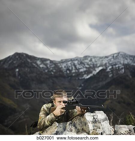 man hunting in the wilderness View Large Photo Image Stock Image - man hunting in the wilderness. Fotosearch