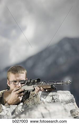 man hunting in the wilderness View Large Photo Image Stock Image - man hunting in the wilderness. Fotosearch