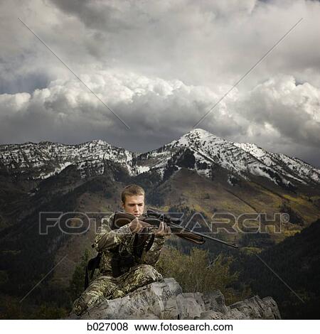 man hunting in the wilderness View Large Photo Image Stock Photo - man hunting in the wilderness. Fotosearch