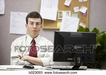 man in a cubicle View Large Photo Image Stock Image - man in a cubicle. Fotosearch