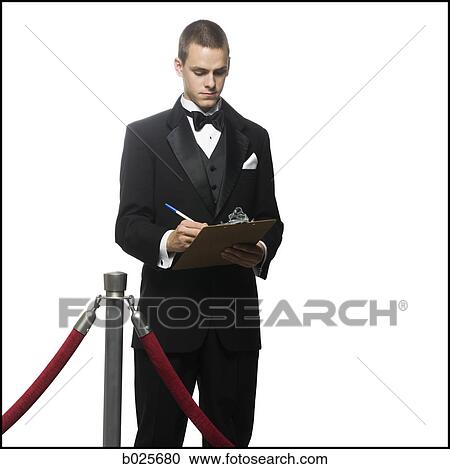 man in a tuxedo next to a velvet rope View Large Photo Image Stock Image - man in a tuxedo next to a velvet rope. Fotosearch