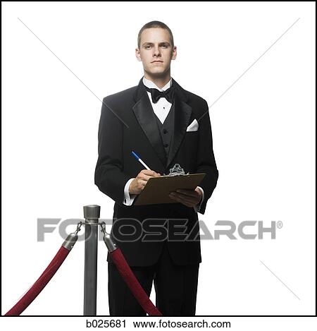 man in a tuxedo next to a velvet rope View Large Photo Image Stock Image - man in a tuxedo next to a velvet rope. Fotosearch
