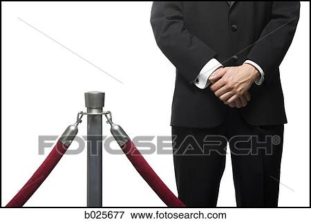 man in a tuxedo next to a velvet rope View Large Photo Image Stock Photo - man in a tuxedo next to a velvet rope. Fotosearch