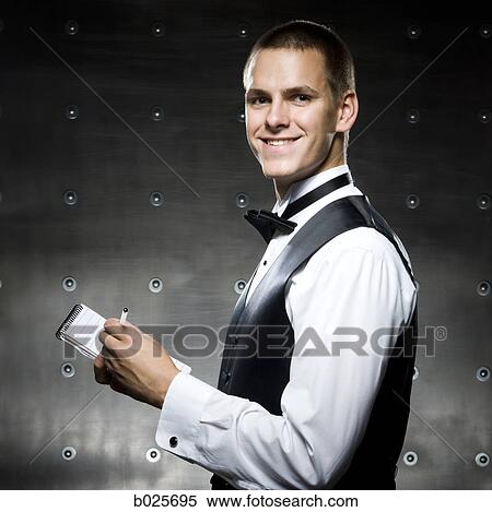 man in a tuxedo taking notes View Large Photo Image Stock Photography - man in a tuxedo taking notes. Fotosearch
